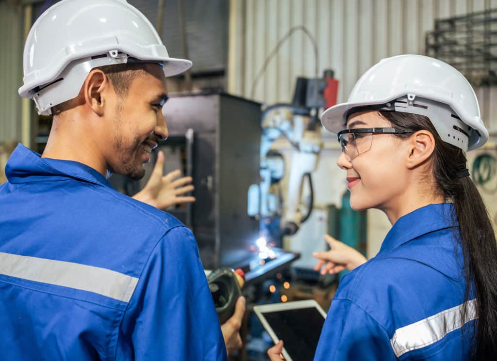 Industrial worker working in manufacturing plant