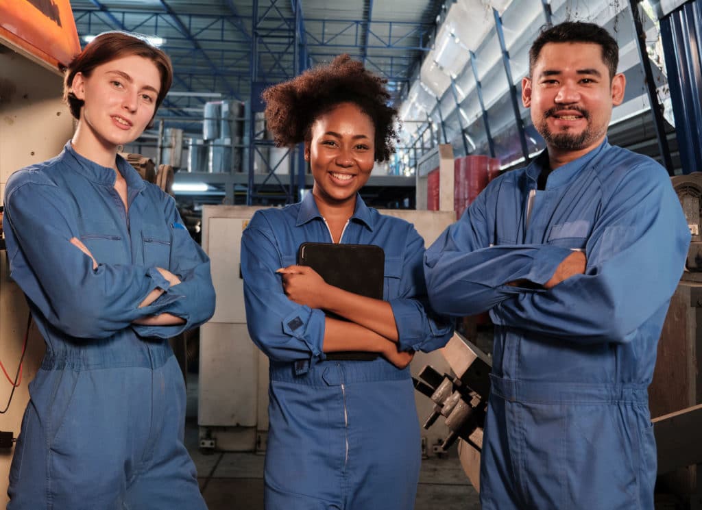 Cheerful multiracial industry workers